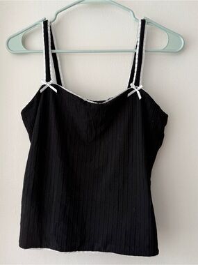 Klassy black cami top with white bow detail